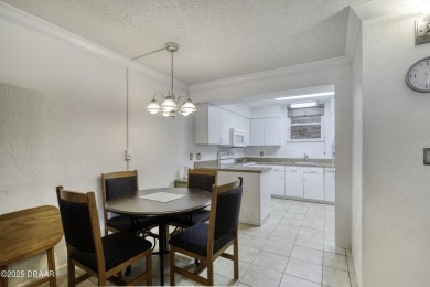 Enjoy easy living in this beautifully furnished 2-bedroom on Daytona Beach Golf Club in Florida - for sale on GolfHomes.com, golf home, golf lot