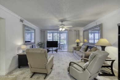 Enjoy easy living in this beautifully furnished 2-bedroom on Daytona Beach Golf Club in Florida - for sale on GolfHomes.com, golf home, golf lot