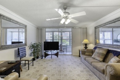 Enjoy easy living in this beautifully furnished 2-bedroom on Daytona Beach Golf Club in Florida - for sale on GolfHomes.com, golf home, golf lot