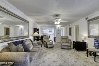 Enjoy easy living in this beautifully furnished 2-bedroom on Daytona Beach Golf Club in Florida - for sale on GolfHomes.com, golf home, golf lot