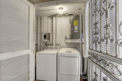 Enjoy easy living in this beautifully furnished 2-bedroom on Daytona Beach Golf Club in Florida - for sale on GolfHomes.com, golf home, golf lot
