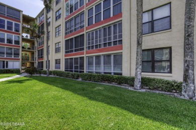 Enjoy easy living in this beautifully furnished 2-bedroom on Daytona Beach Golf Club in Florida - for sale on GolfHomes.com, golf home, golf lot