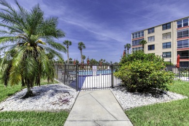 Enjoy easy living in this beautifully furnished 2-bedroom on Daytona Beach Golf Club in Florida - for sale on GolfHomes.com, golf home, golf lot