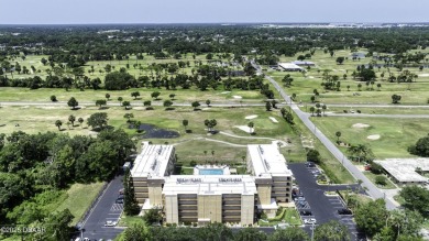 Enjoy easy living in this beautifully furnished 2-bedroom on Daytona Beach Golf Club in Florida - for sale on GolfHomes.com, golf home, golf lot