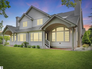 Bass Lake front Quality Condo with sunset views. Tile, Granite on Elk Rapids Golf Club in Michigan - for sale on GolfHomes.com, golf home, golf lot