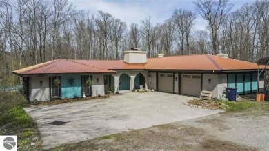 This unique 3900 sq foot resort- like residence is located on a on The Chief Golf Course in Michigan - for sale on GolfHomes.com, golf home, golf lot
