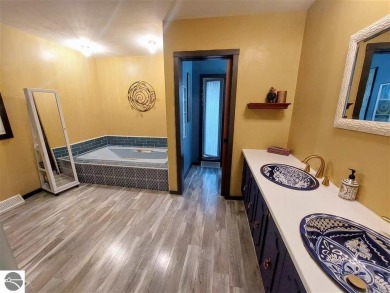 This unique 3900 sq foot resort- like residence is located on a on The Chief Golf Course in Michigan - for sale on GolfHomes.com, golf home, golf lot