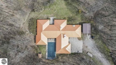 This unique 3900 sq foot resort- like residence is located on a on The Chief Golf Course in Michigan - for sale on GolfHomes.com, golf home, golf lot