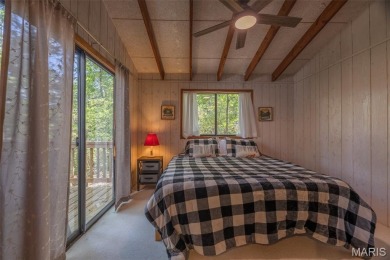 This cozy chalet offers the classic A-frame design with a on Innsbrook Resort Golf Course in Missouri - for sale on GolfHomes.com, golf home, golf lot