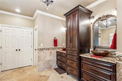 Discover refined living nestled in the Beau Chene community of on Beau Chene Country Club in Louisiana - for sale on GolfHomes.com, golf home, golf lot