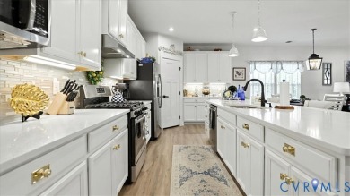 WOW JUST WOW! This Palladio 2 story shows like a model! Upgraded on The Westham Golf Club At Magnolia Green in Virginia - for sale on GolfHomes.com, golf home, golf lot