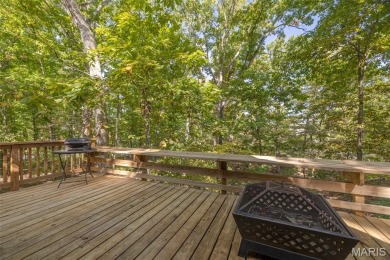 This cozy chalet offers the classic A-frame design with a on Innsbrook Resort Golf Course in Missouri - for sale on GolfHomes.com, golf home, golf lot