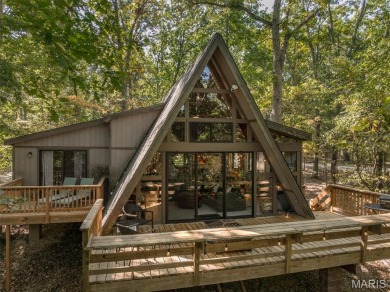 This cozy chalet offers the classic A-frame design with a on Innsbrook Resort Golf Course in Missouri - for sale on GolfHomes.com, golf home, golf lot