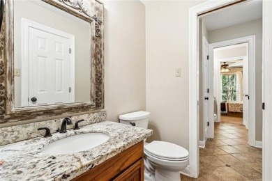 Discover refined living nestled in the Beau Chene community of on Beau Chene Country Club in Louisiana - for sale on GolfHomes.com, golf home, golf lot