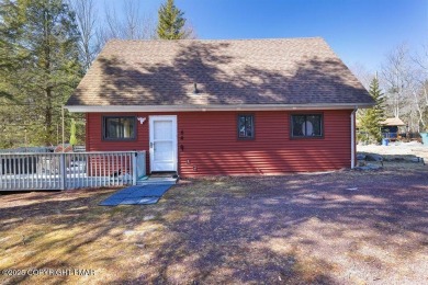 Don't let the outside fool you, this home feels more spacious on Pocono Farms Country Club in Pennsylvania - for sale on GolfHomes.com, golf home, golf lot