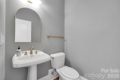 Welcome to this beautifully updated 5-bedroom, 4.5-bath custom on Cowans Ford Country Club in North Carolina - for sale on GolfHomes.com, golf home, golf lot