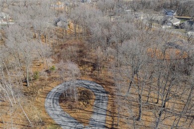 Tucked away at the end of a quiet cul-de-sac in Bella Vista's on Bella Vista Country Club - Highlands in Arkansas - for sale on GolfHomes.com, golf home, golf lot
