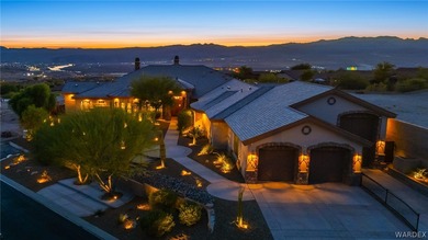 Nearly 6,000 Sq Ft of Purposeful Luxury with Dual Primary Suites on Laughlin Ranch Golf Club in Arizona - for sale on GolfHomes.com, golf home, golf lot