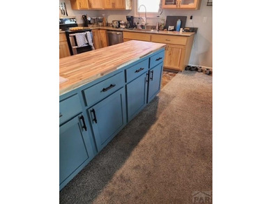 Beautifully landscaped home located in the desirable Pueblo West on Desert Hawk At Pueblo West in Colorado - for sale on GolfHomes.com, golf home, golf lot