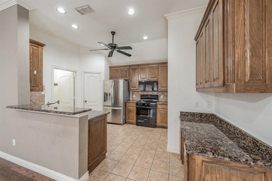 Move-in ready and full of charm, this 3-bedroom, 2-bathroom home on WaterChase Golf Club in Texas - for sale on GolfHomes.com, golf home, golf lot