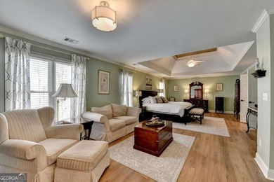 Rare. Refined. Ready to Impress-In Hampton Golf Village. This on Hampton Golf Village in Georgia - for sale on GolfHomes.com, golf home, golf lot