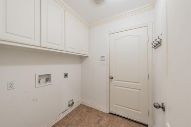 Move-in ready and full of charm, this 3-bedroom, 2-bathroom home on WaterChase Golf Club in Texas - for sale on GolfHomes.com, golf home, golf lot