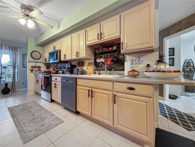 You do not want to miss the opportunity to call this gem on Pinemoor West Golf Club in Florida - for sale on GolfHomes.com, golf home, golf lot