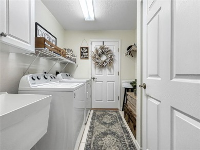 You do not want to miss the opportunity to call this gem on Pinemoor West Golf Club in Florida - for sale on GolfHomes.com, golf home, golf lot