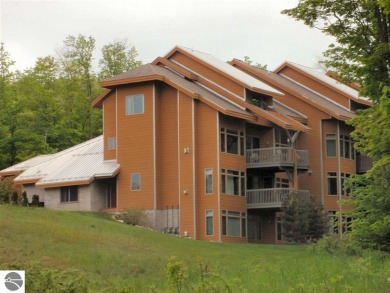 Ski-In/Ski-Out Shanty Creek Condo Overlooking the 18th Green - on Cedar River Golf Course in Michigan - for sale on GolfHomes.com, golf home, golf lot