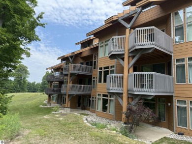 Ski-In/Ski-Out Shanty Creek Condo Overlooking the 18th Green - on Cedar River Golf Course in Michigan - for sale on GolfHomes.com, golf home, golf lot