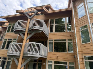Ski-In/Ski-Out Shanty Creek Condo Overlooking the 18th Green - on Cedar River Golf Course in Michigan - for sale on GolfHomes.com, golf home, golf lot