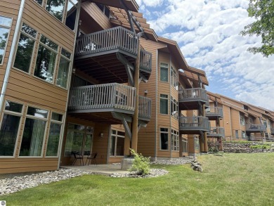 Ski-In/Ski-Out Shanty Creek Condo Overlooking the 18th Green - on Cedar River Golf Course in Michigan - for sale on GolfHomes.com, golf home, golf lot