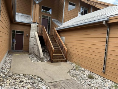 Ski-In/Ski-Out Shanty Creek Condo Overlooking the 18th Green - on Cedar River Golf Course in Michigan - for sale on GolfHomes.com, golf home, golf lot