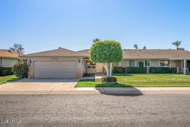 Don't miss this beautifully updated rare 3-bedroom, 2-bath on Sun City Lakes West and East in Arizona - for sale on GolfHomes.com, golf home, golf lot