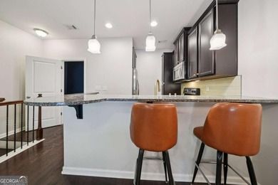 Discover contemporary elegance and unbeatable location at City on Bobby Jones Golf Club in Georgia - for sale on GolfHomes.com, golf home, golf lot