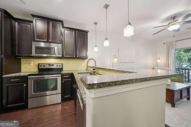 Discover contemporary elegance and unbeatable location at City on Bobby Jones Golf Club in Georgia - for sale on GolfHomes.com, golf home, golf lot