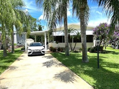 Welcome to this immaculately kept 3-bedroom, 2-bathroom home on Golf Hammock Country Club in Florida - for sale on GolfHomes.com, golf home, golf lot