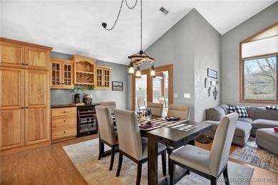 This stunning lakefront home in Four Seasons offers 75 feet of on Seasons Ridge At Four Seasons in Missouri - for sale on GolfHomes.com, golf home, golf lot