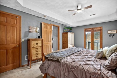 This stunning lakefront home in Four Seasons offers 75 feet of on Seasons Ridge At Four Seasons in Missouri - for sale on GolfHomes.com, golf home, golf lot