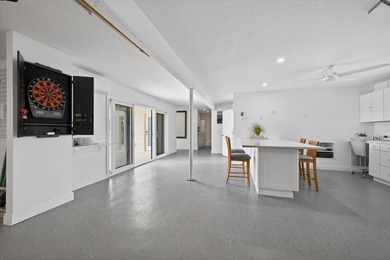 Experience elevated coastal living in this luxuriously updated on Gulf Harbors Golf Course in Florida - for sale on GolfHomes.com, golf home, golf lot