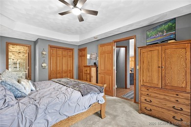 This stunning lakefront home in Four Seasons offers 75 feet of on Seasons Ridge At Four Seasons in Missouri - for sale on GolfHomes.com, golf home, golf lot