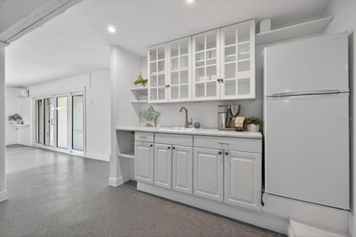 Experience elevated coastal living in this luxuriously updated on Gulf Harbors Golf Course in Florida - for sale on GolfHomes.com, golf home, golf lot