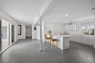 Experience elevated coastal living in this luxuriously updated on Gulf Harbors Golf Course in Florida - for sale on GolfHomes.com, golf home, golf lot