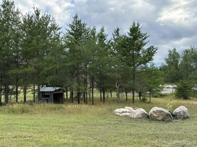 Nestled on over 8 acres, this 3-bedroom home offers a perfect on TimberStone At Pine Mountain in Michigan - for sale on GolfHomes.com, golf home, golf lot