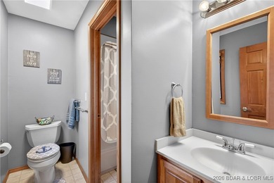 This stunning lakefront home in Four Seasons offers 75 feet of on Seasons Ridge At Four Seasons in Missouri - for sale on GolfHomes.com, golf home, golf lot