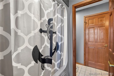 This stunning lakefront home in Four Seasons offers 75 feet of on Seasons Ridge At Four Seasons in Missouri - for sale on GolfHomes.com, golf home, golf lot