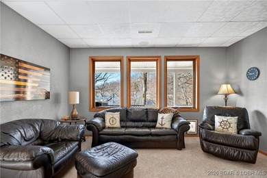 This stunning lakefront home in Four Seasons offers 75 feet of on Seasons Ridge At Four Seasons in Missouri - for sale on GolfHomes.com, golf home, golf lot