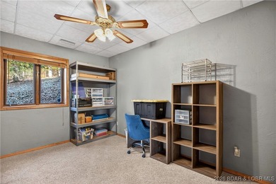 This stunning lakefront home in Four Seasons offers 75 feet of on Seasons Ridge At Four Seasons in Missouri - for sale on GolfHomes.com, golf home, golf lot