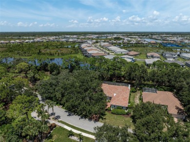 Step into Florida living with this exquisite home, offering over on Calusa Lakes Golf Club in Florida - for sale on GolfHomes.com, golf home, golf lot