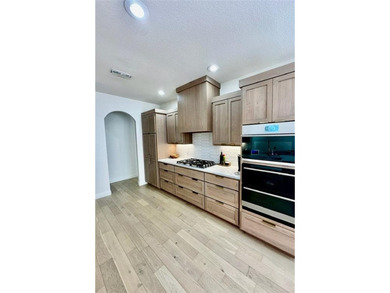 Experience modern luxury living in Shadow Valley, a fully on Shadow Valley Country Club in Arkansas - for sale on GolfHomes.com, golf home, golf lot